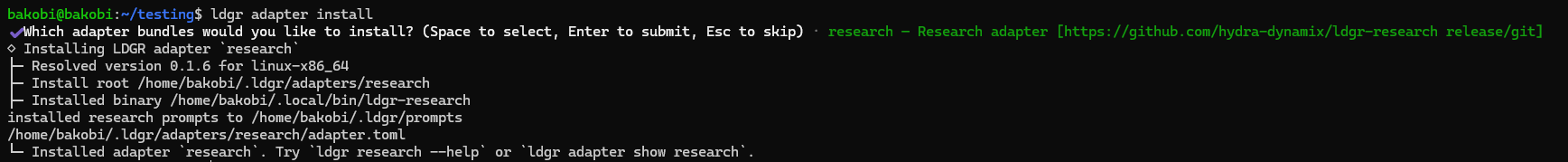 Completed terminal adapter installation showing the installed binary, prompts, manifest, and next command.